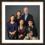 family portrait in elegant black and gold frame