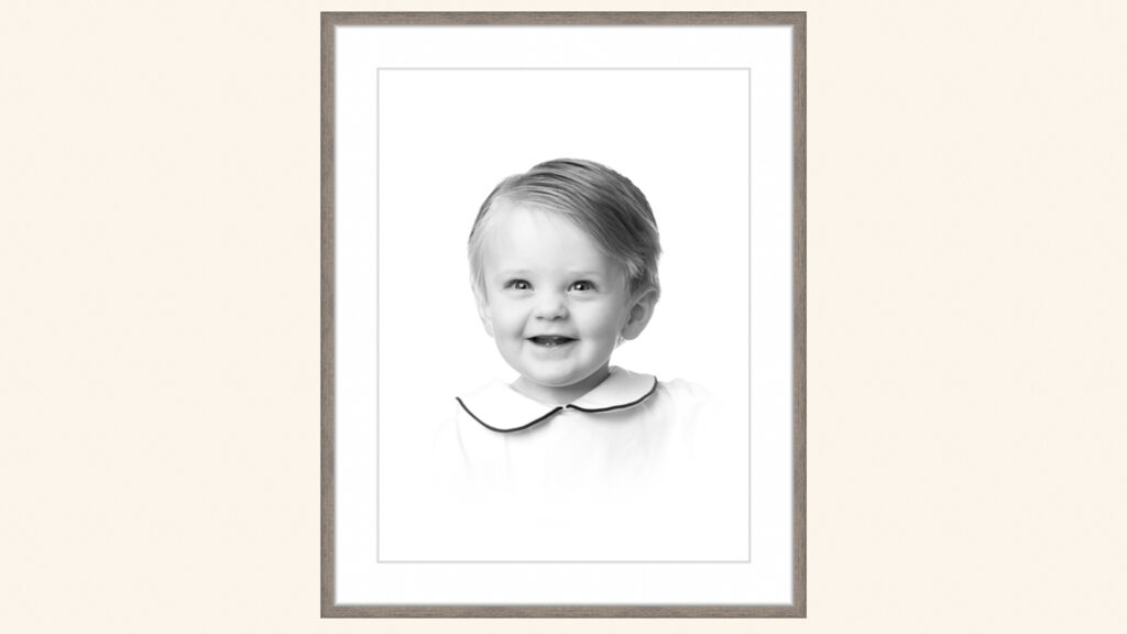 Smiling toddler in a white collared shirt against a white background, framed Heirloom Portrait | Lisa Maco Photography