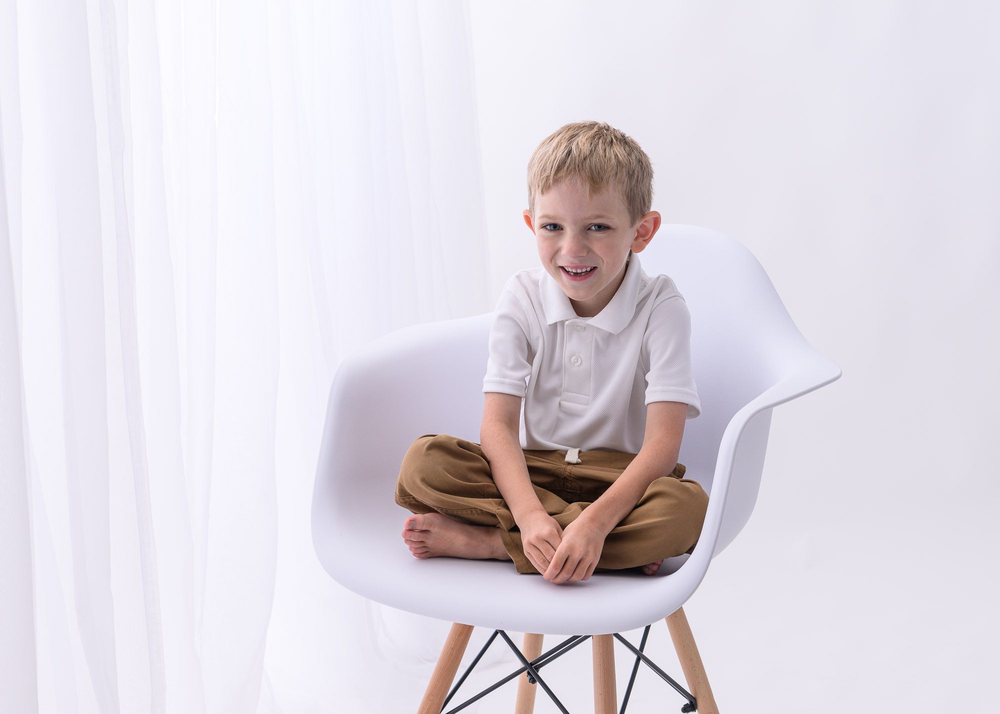 photo of young boy in neutral setting