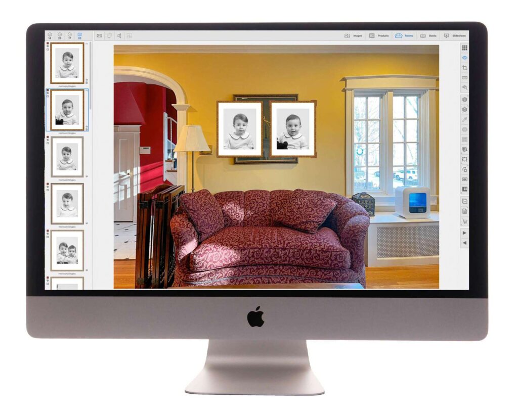 iMac displaying interior design software showing a bright yellow living room with burgundy sofa and portrait gallery wall